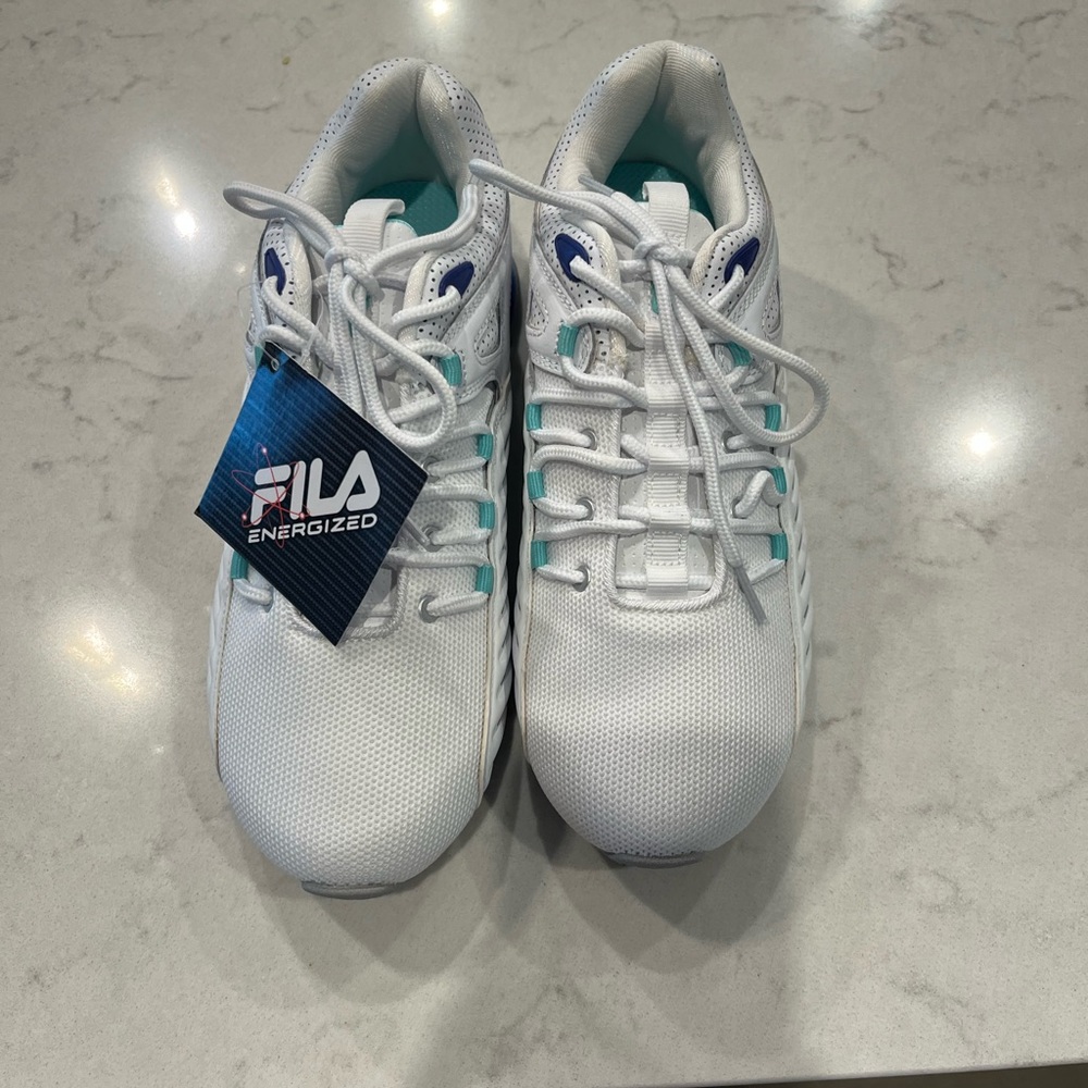 New with tags FILA energize gym shoes, sneakers. NEVER WORN brand new